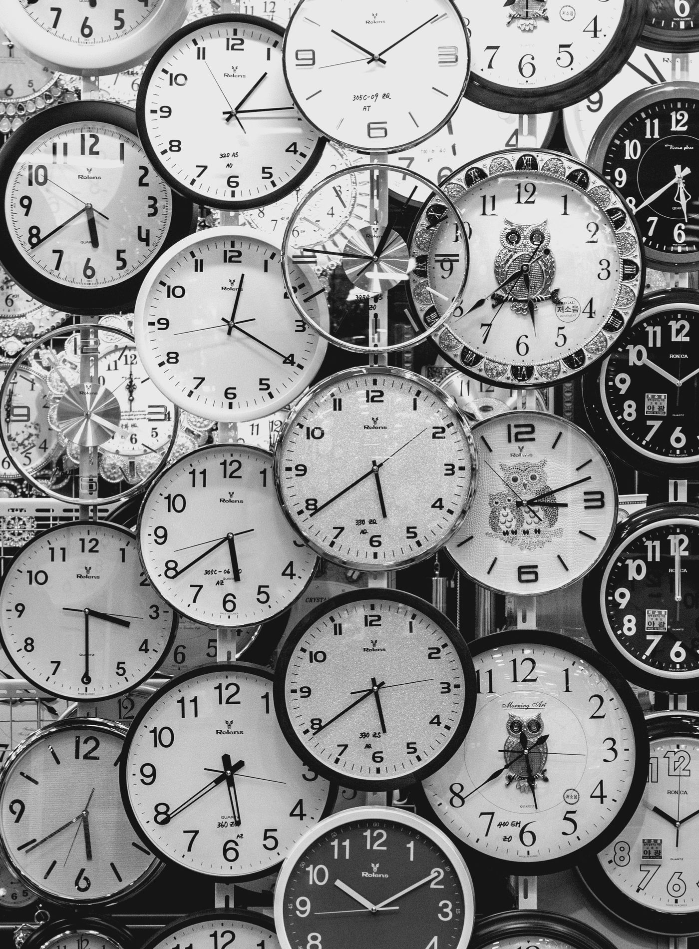 A collection of different vintage wall clocks